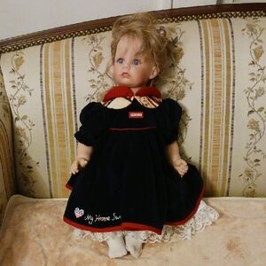 Adorable Doll By Susan Wakeen  in Navy and Red Dress.